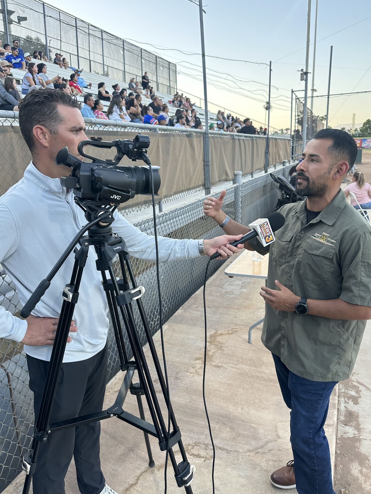 Jose Santos interviewed by local news at the Coachella Valley All-Star Baseball Classic