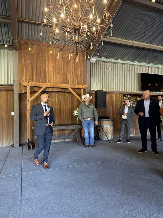 Jose Santos speaking at a member gathering