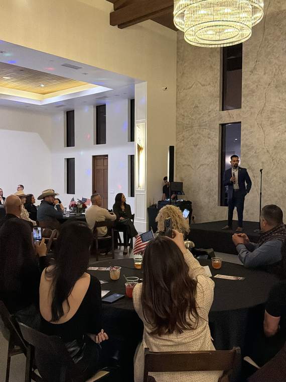 Jose Santos addressing members and guests